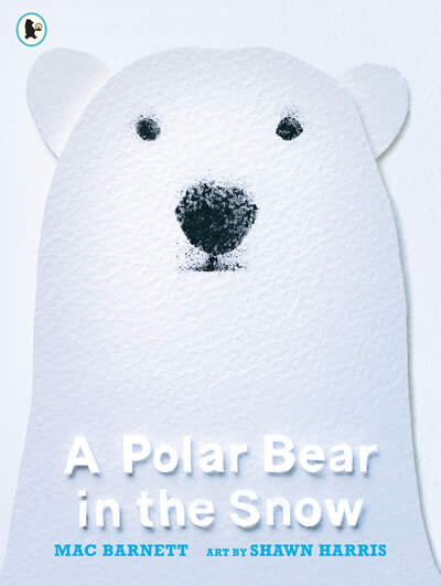 A Polar Bear In The Snow